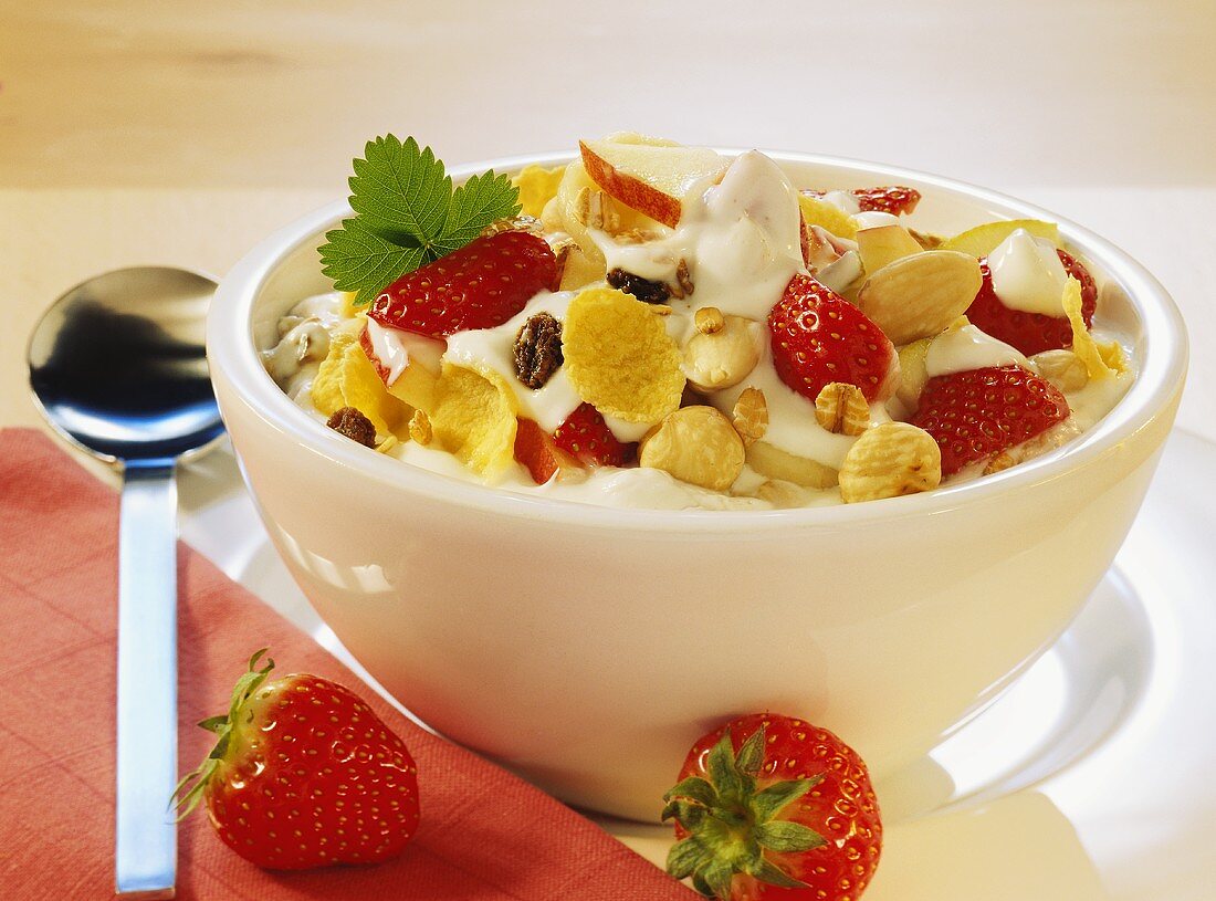 Muesli with nuts, strawberries and yoghurt