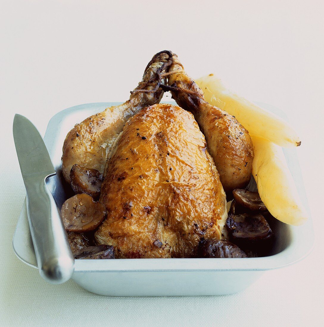 Roast chicken in a roasting dish