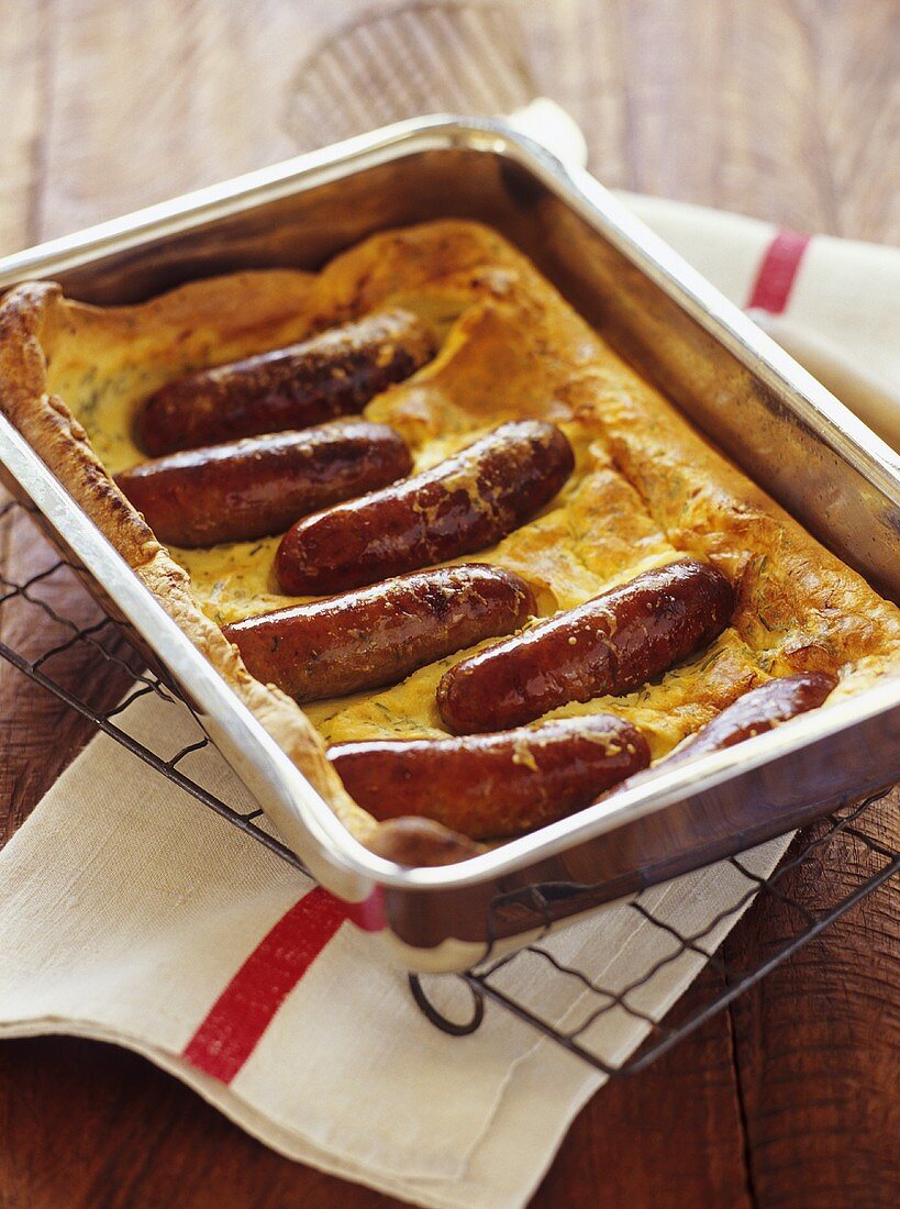 Toad in the hole (sausages baked in batter, UK)