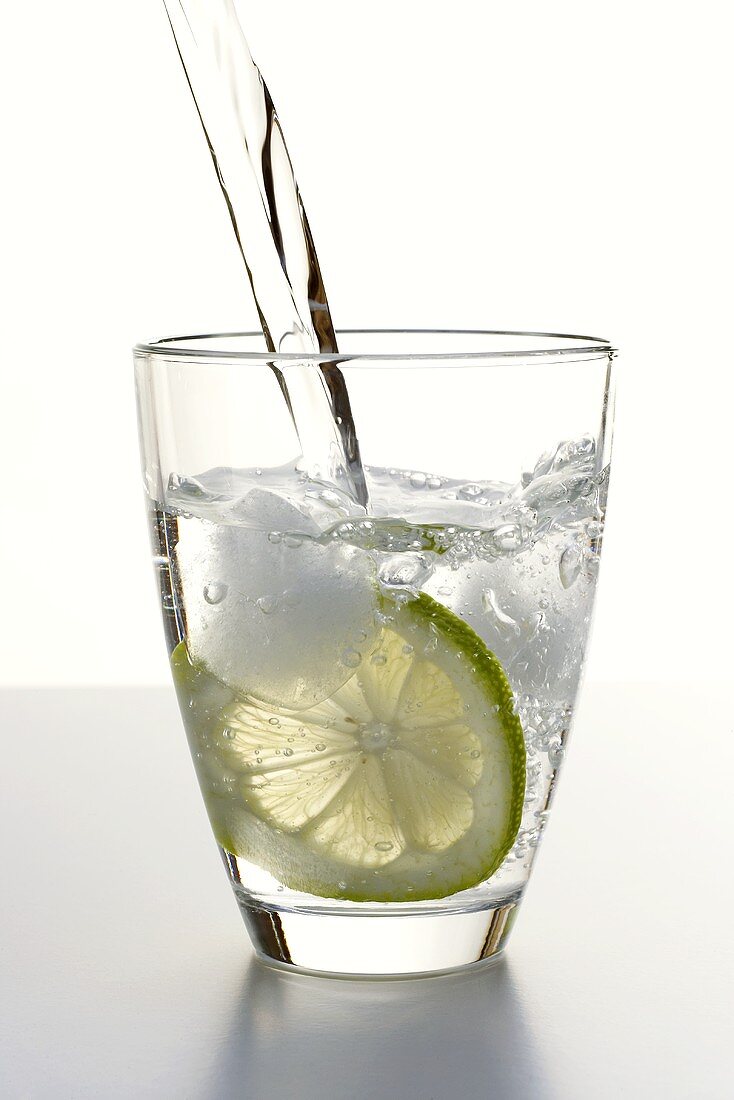 Water being poured into a glass