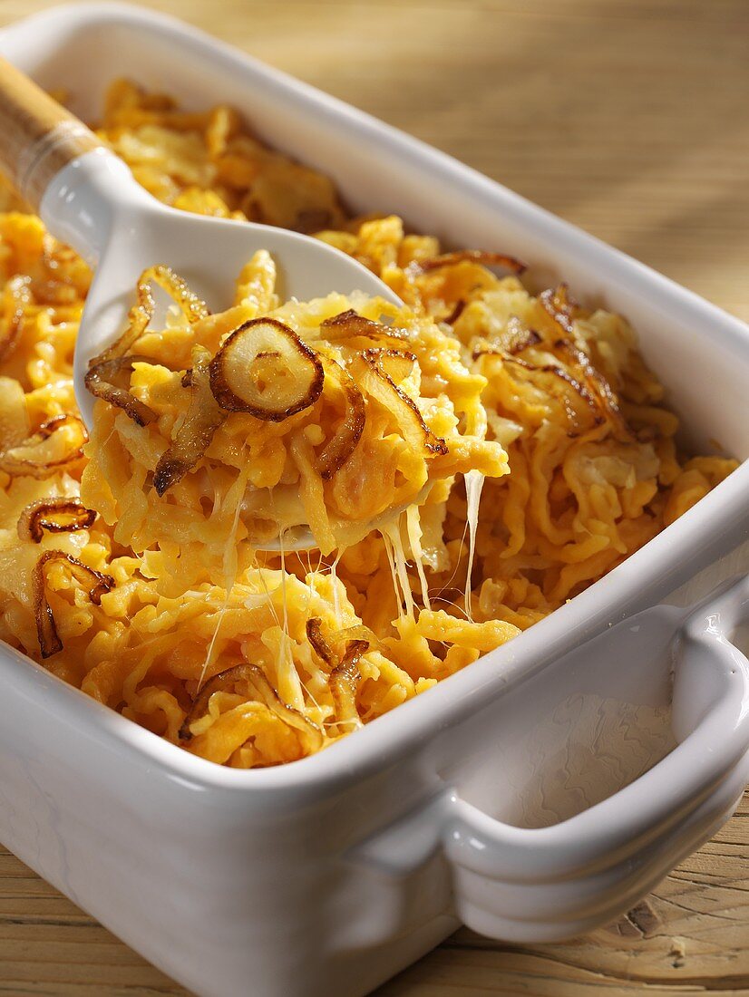 Noodle gratin with pumpkin in a baking dish