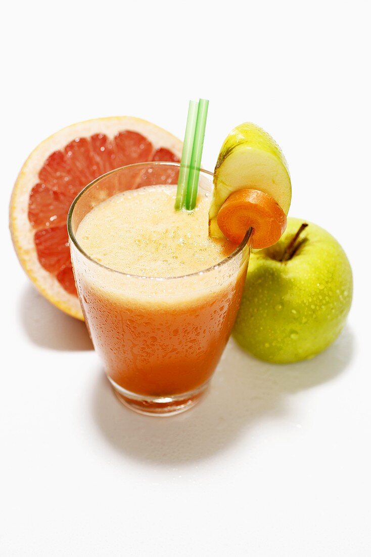 Multivitamin drink with grapefruit, carrot and apple