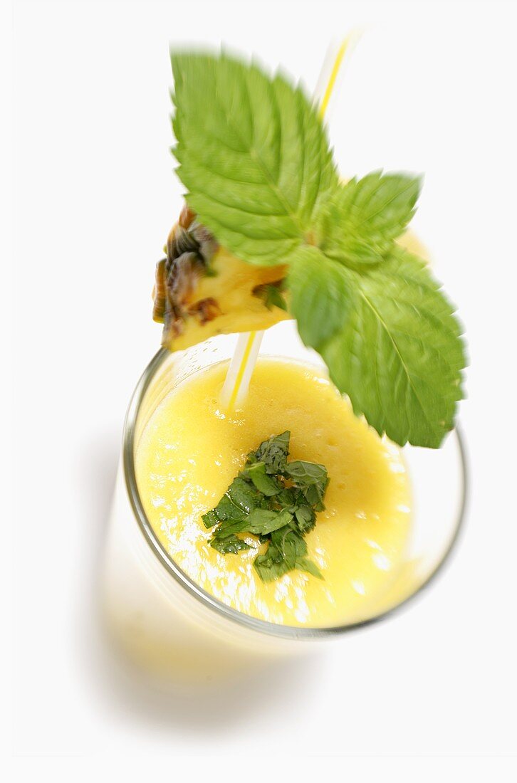 Pineapple drink decorated with mint