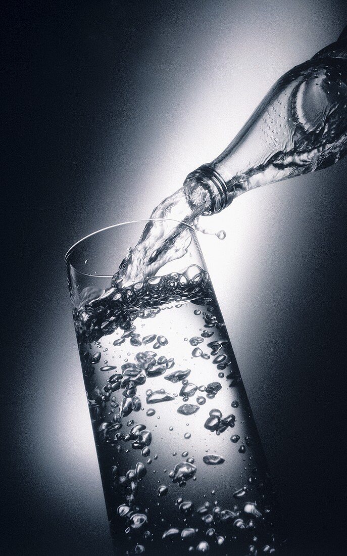 Water being poured into a glass