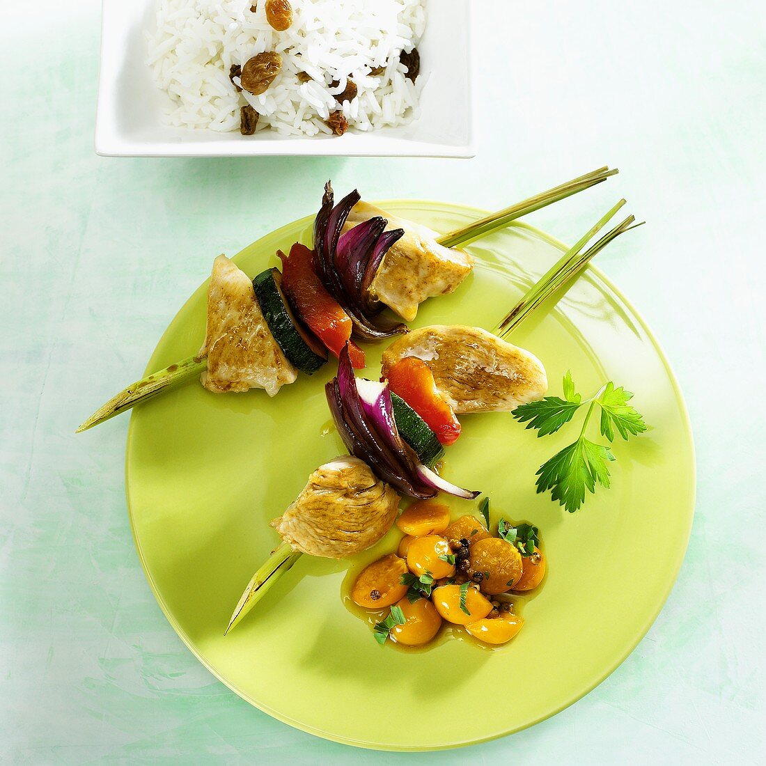 Chicken and vegetable kebab with Physalis compote and rice