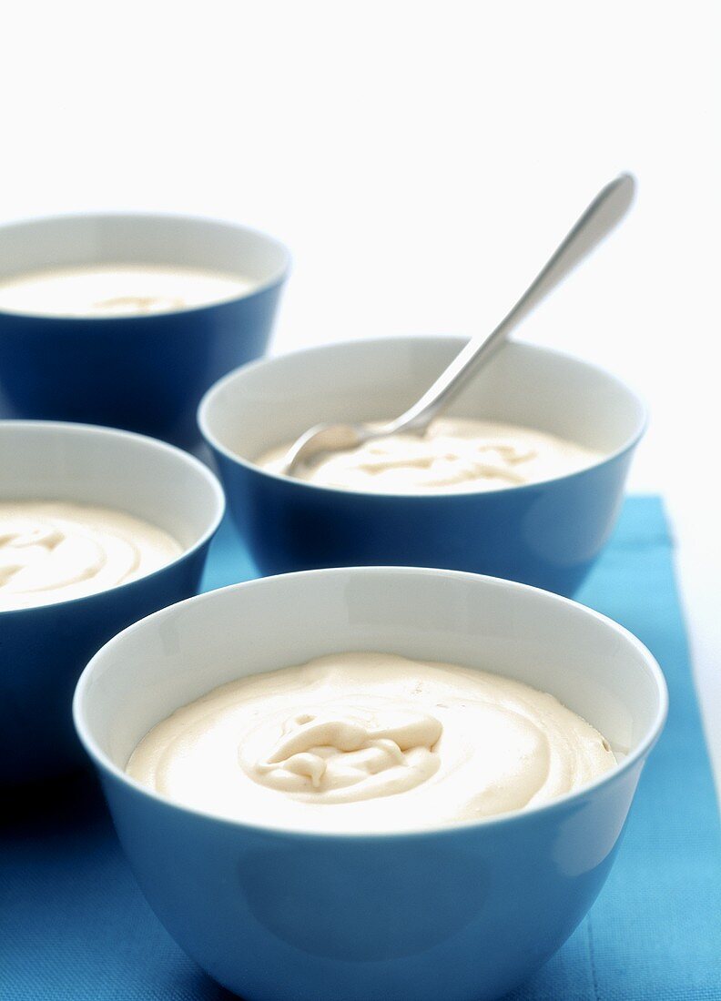 Four bowls of yoghurt