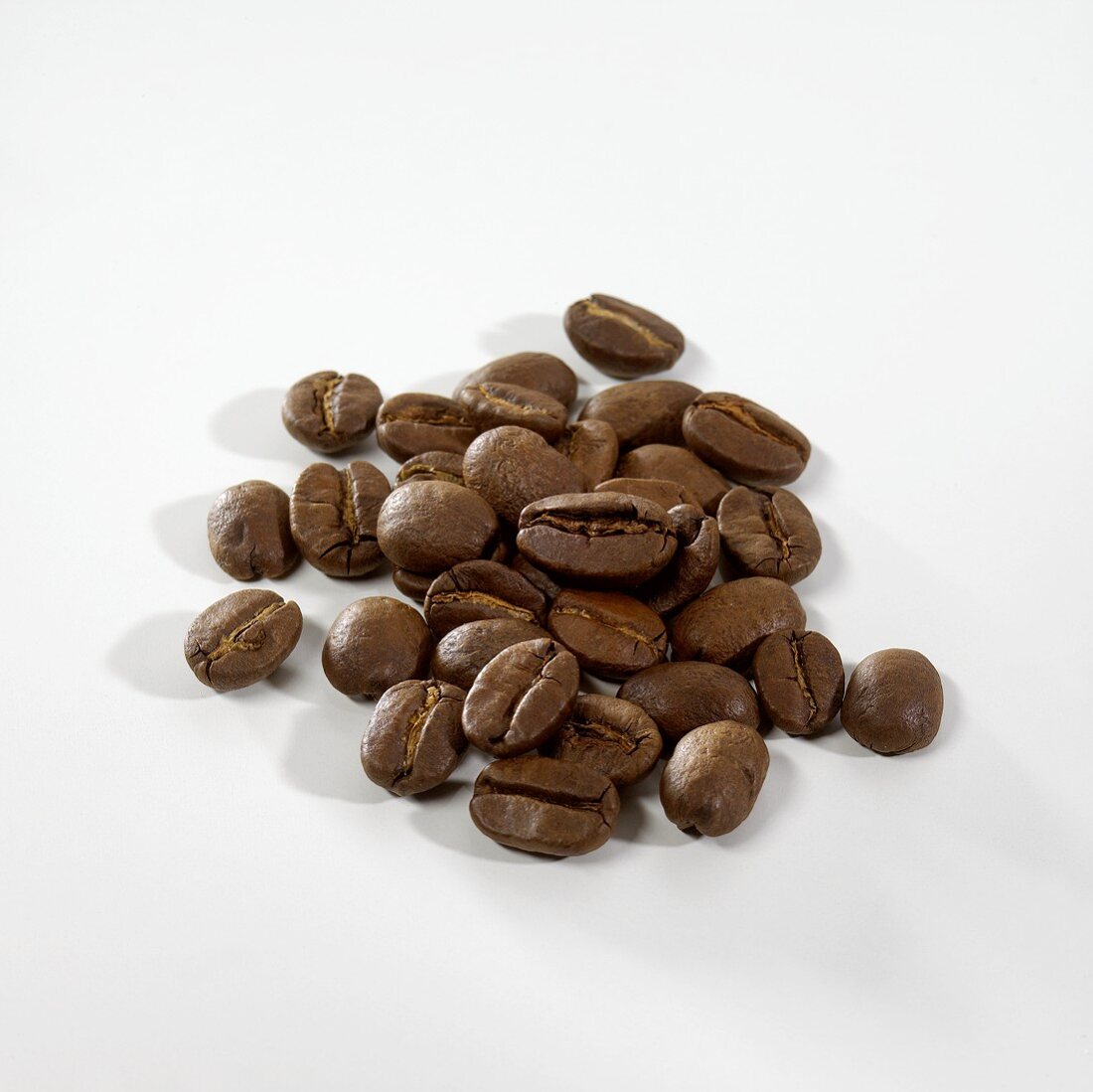 A heap of roasted coffee beans