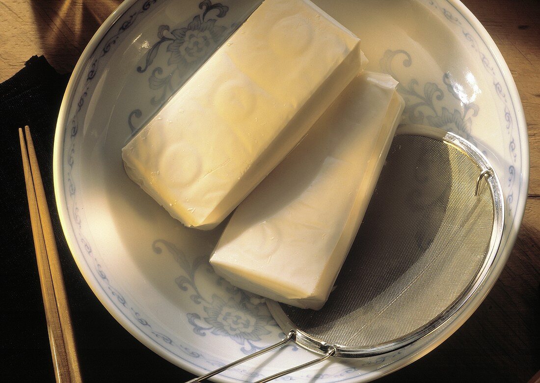 Fresh Tofu in Bowl with Sieve