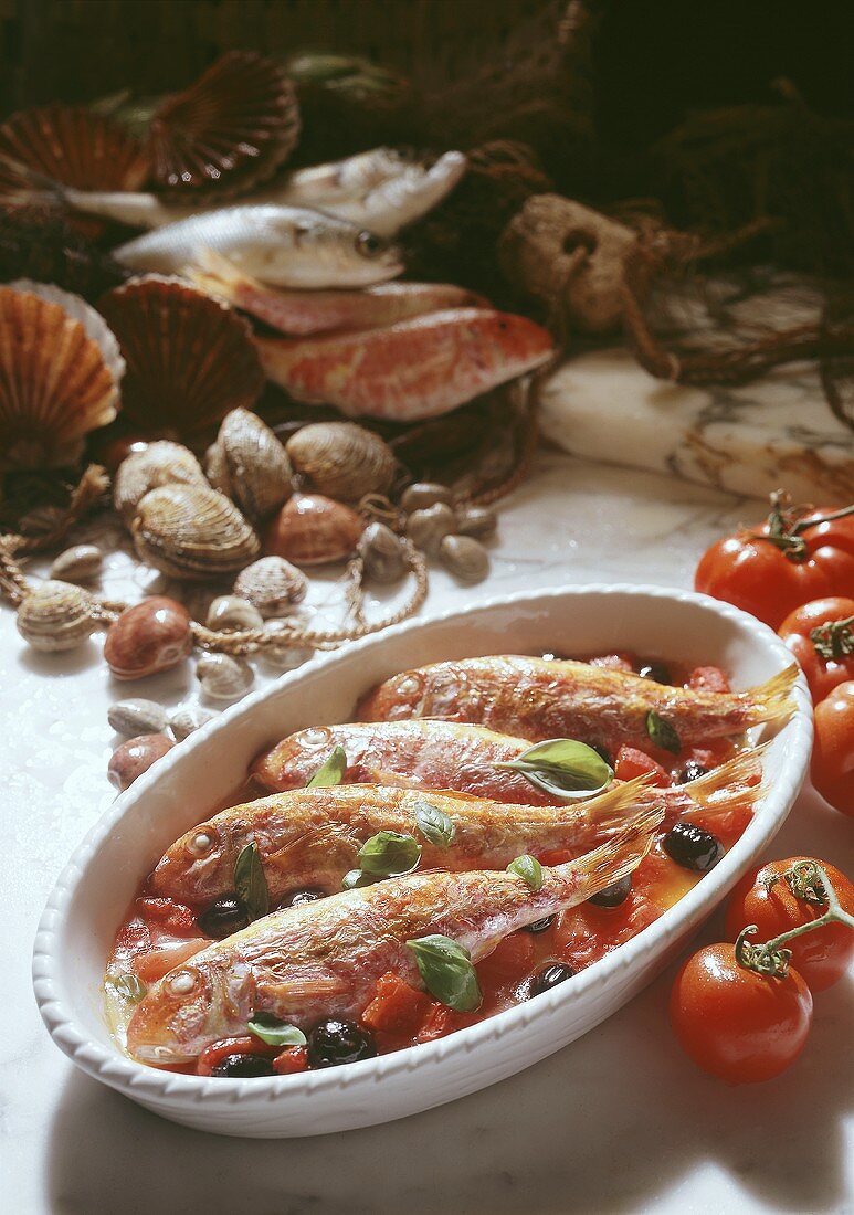 Triglie alla livornese (red mullet in tomato sauce), Italy