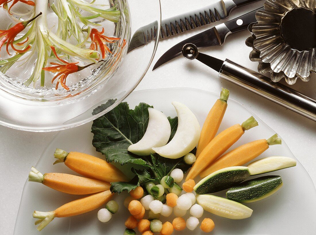 Decoratively Cut Vegetables on a Glass Plate
