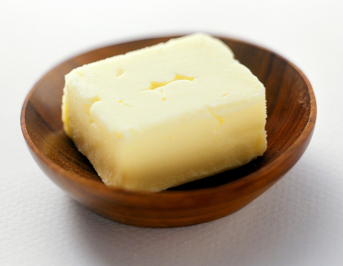 Fresh Butter in a Wooden Bowl