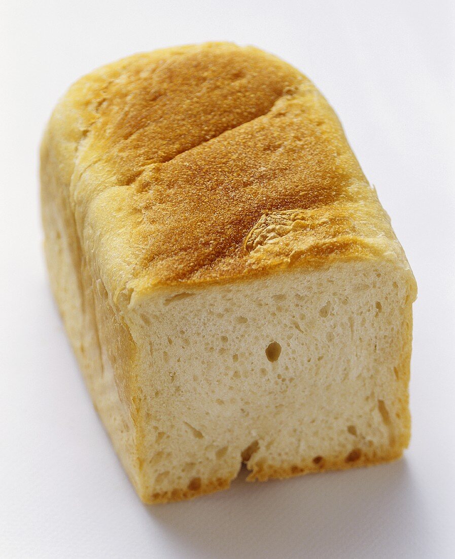 Partially Sliced Loaf of White Bread