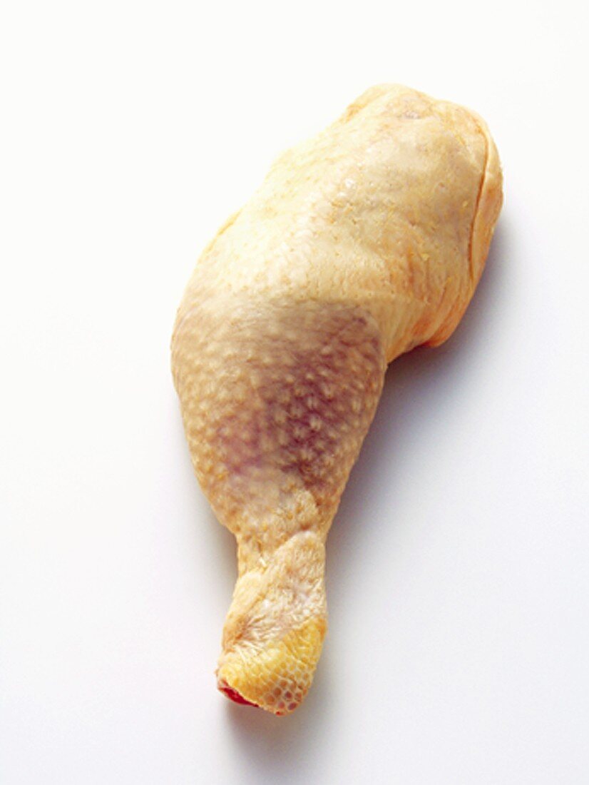 An Uncooked Chicken Leg