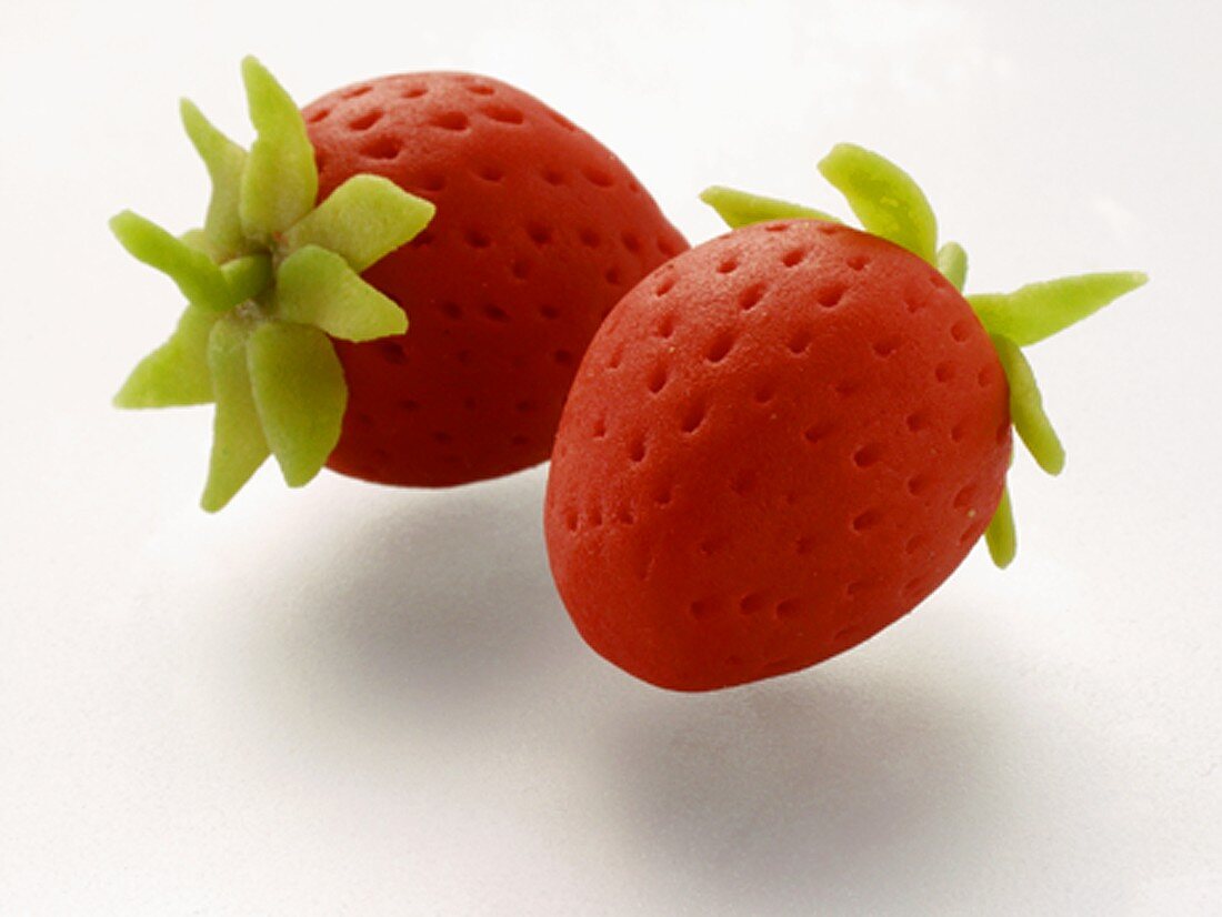 Two marzipan strawberries