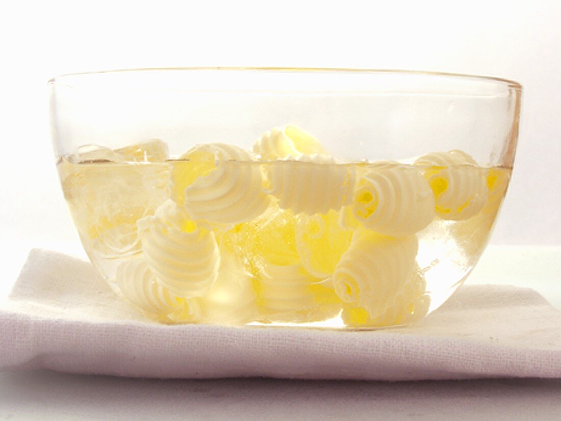 Butter Curls in a Bowl of Water