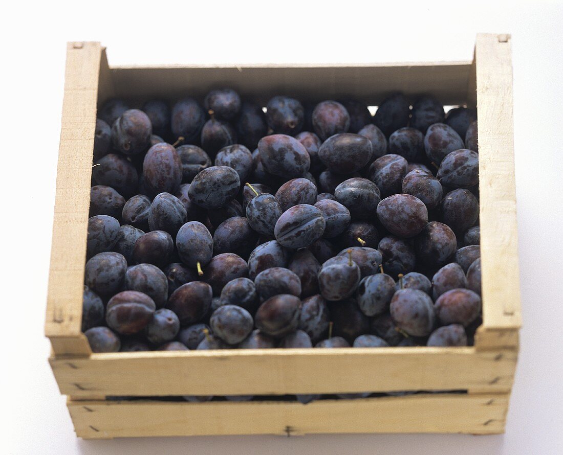 Plums in a Wooden Crate