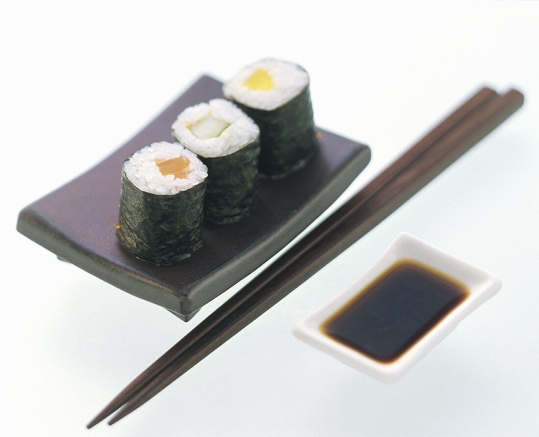 Assorted Maki Sushi with Chopsticks and Dipping Sauce