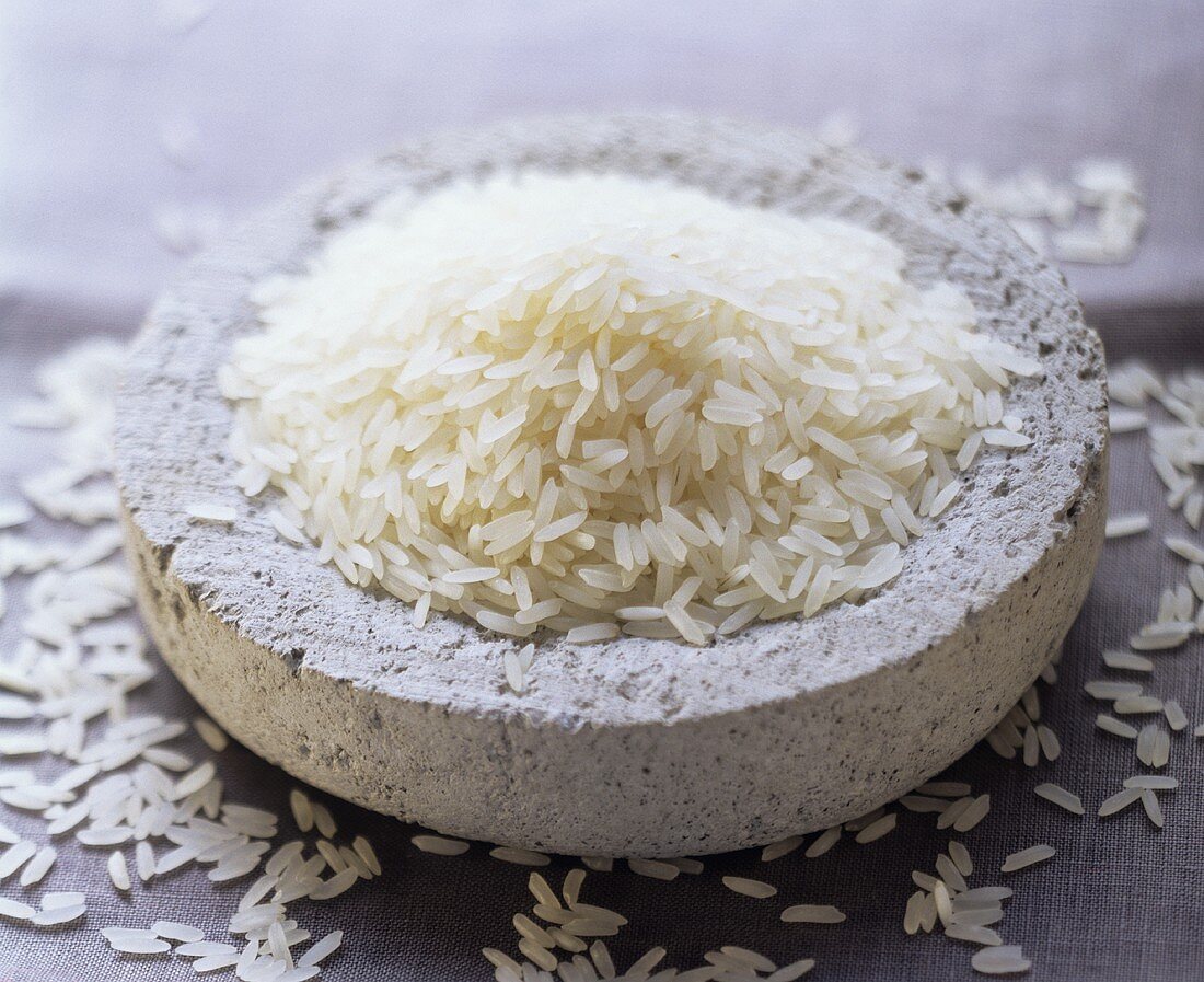 Uncooked Rice in a Clay Dish