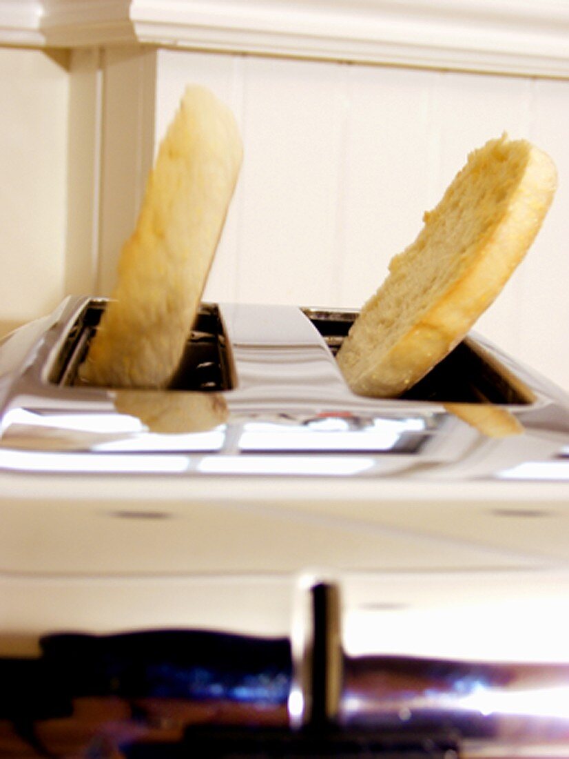 An English Muffin Popping from a Toaster