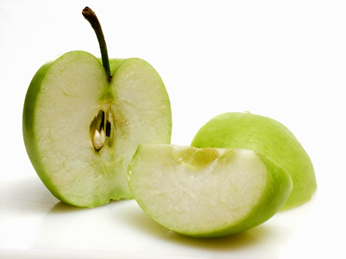 Half and Wedges of Granny Smith Apple