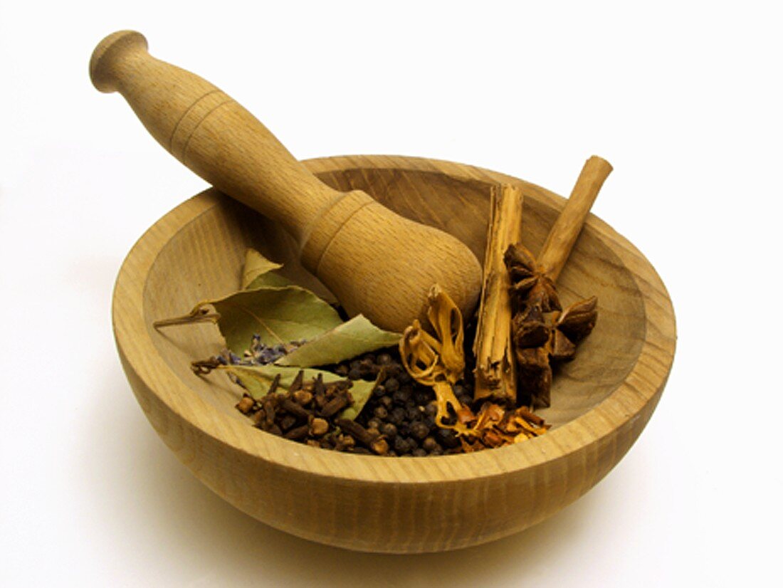 Assorted Dried Spices in a Mortar with Pestle