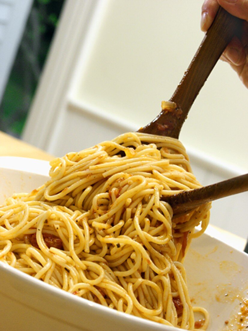 Serving Spaghetti with Tomato Sauce