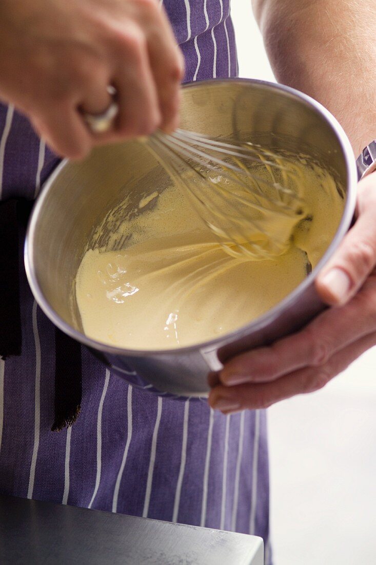 Mixing egg yolks and sugar