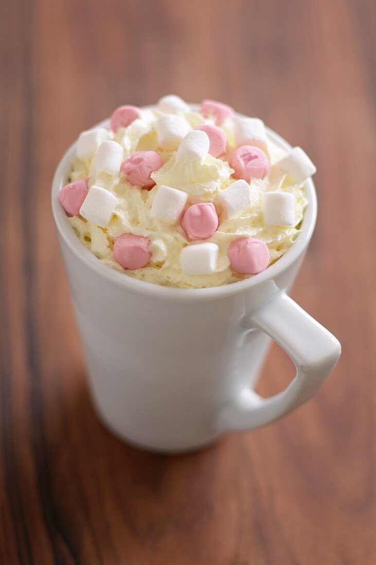 A cup of cappuccino with marshmallows