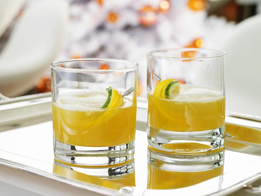 Citrus Sour cocktails on silver tray