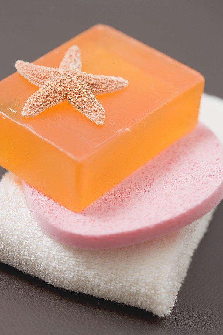 Soap with sponge and towel