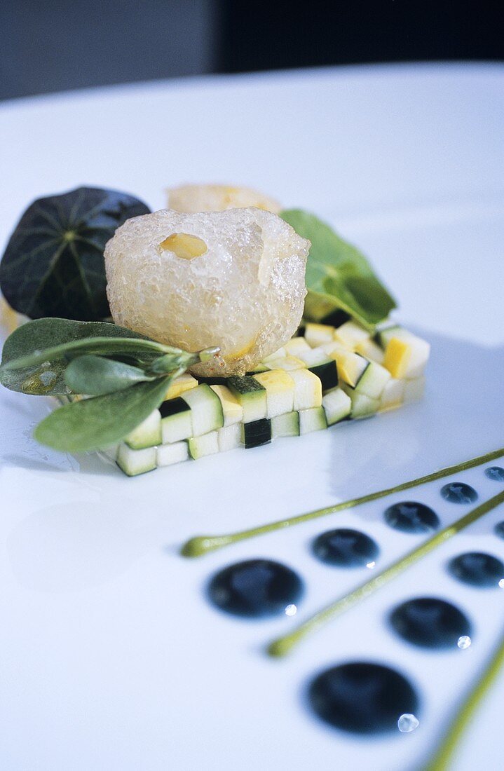 Frothed liquorice syrup on courgettes (Molecular cuisine)
