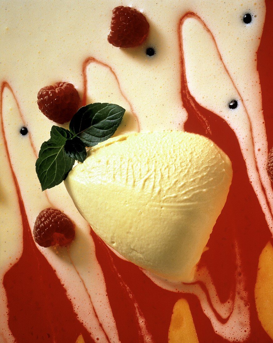 White Chocolate Mousse with Red Berry Sauce