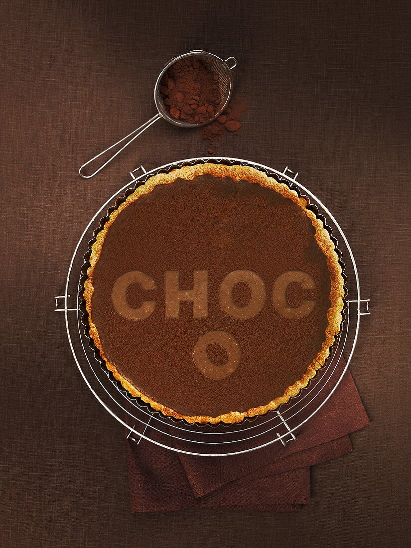 Chocolate tart with the word Choco