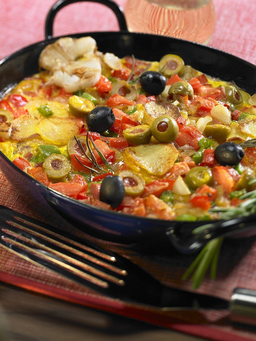 Andalusian omelette with potatoes, olives, tomatoes & onions
