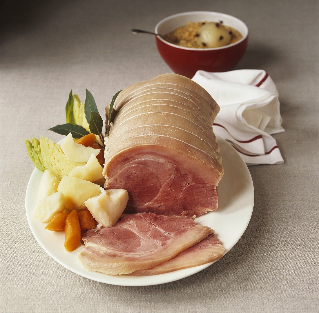 Rolled ham with spicy apple sauce