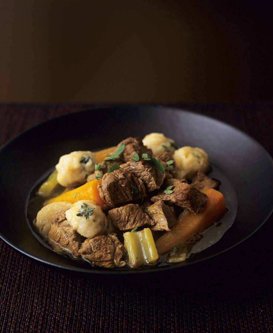 Lamb stew with vegetables and dumplings