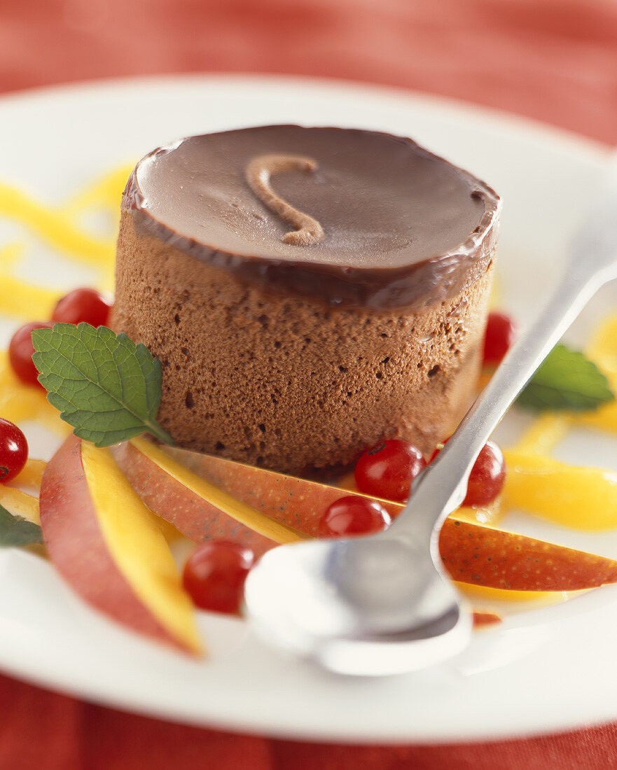 Chocolate mousse garnished with mango slices