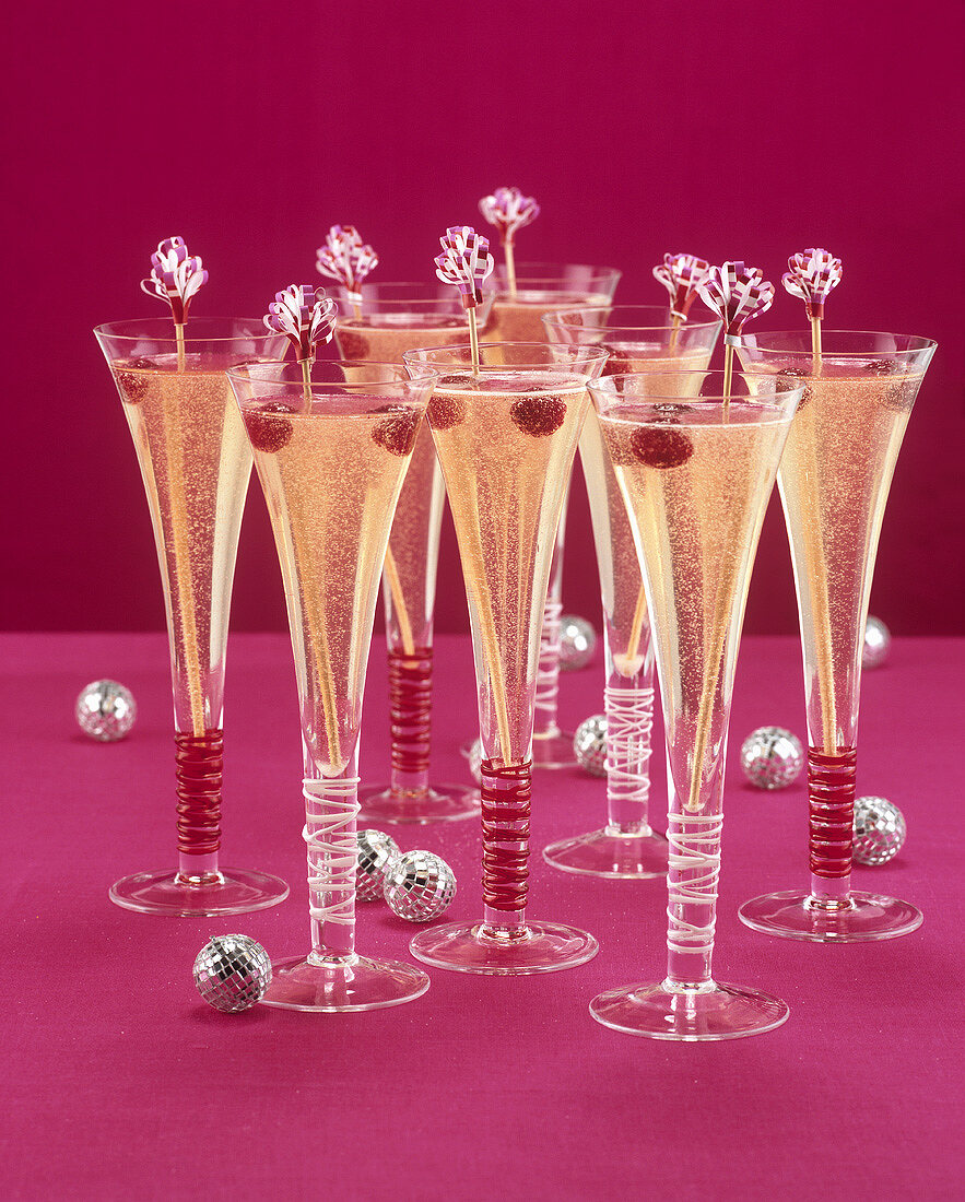 Eight glasses of champagne cocktail