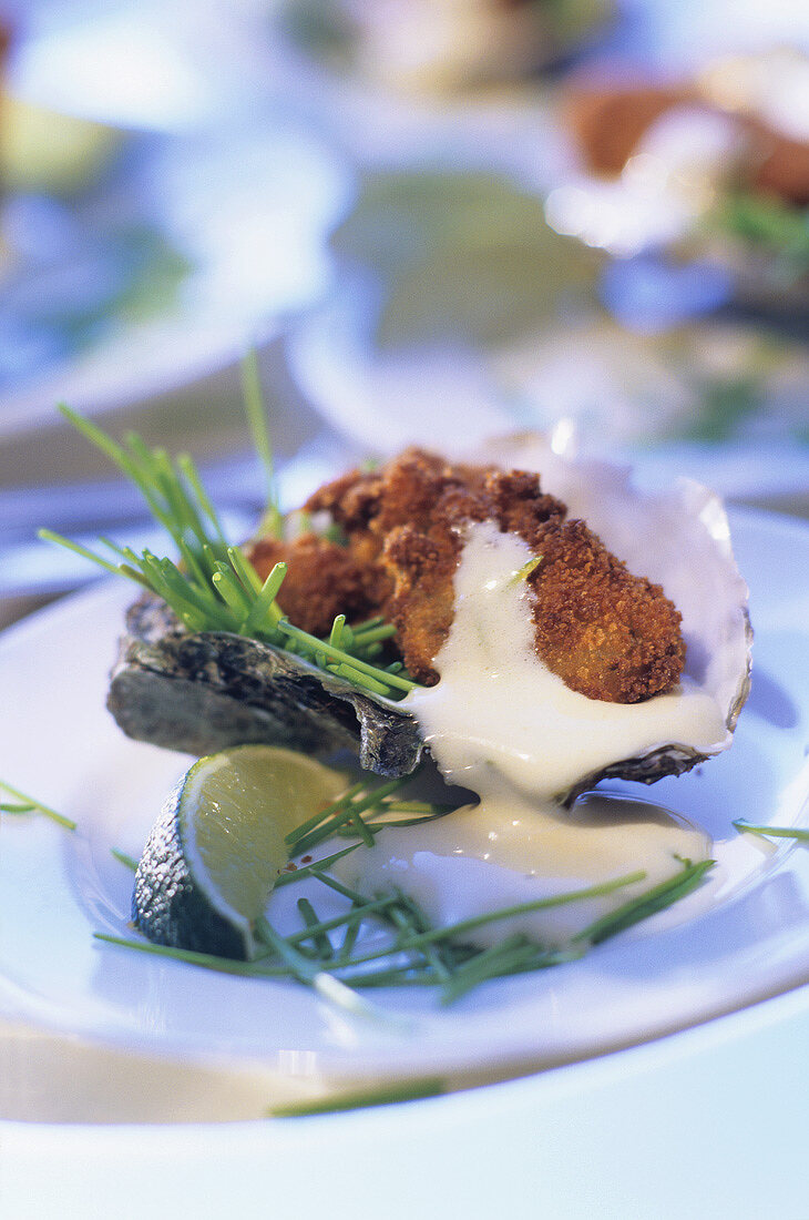 Baked oysters with lime hollandaise