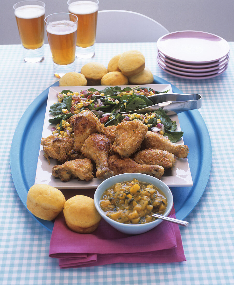 Fried chicken legs with chard and sweetcorn