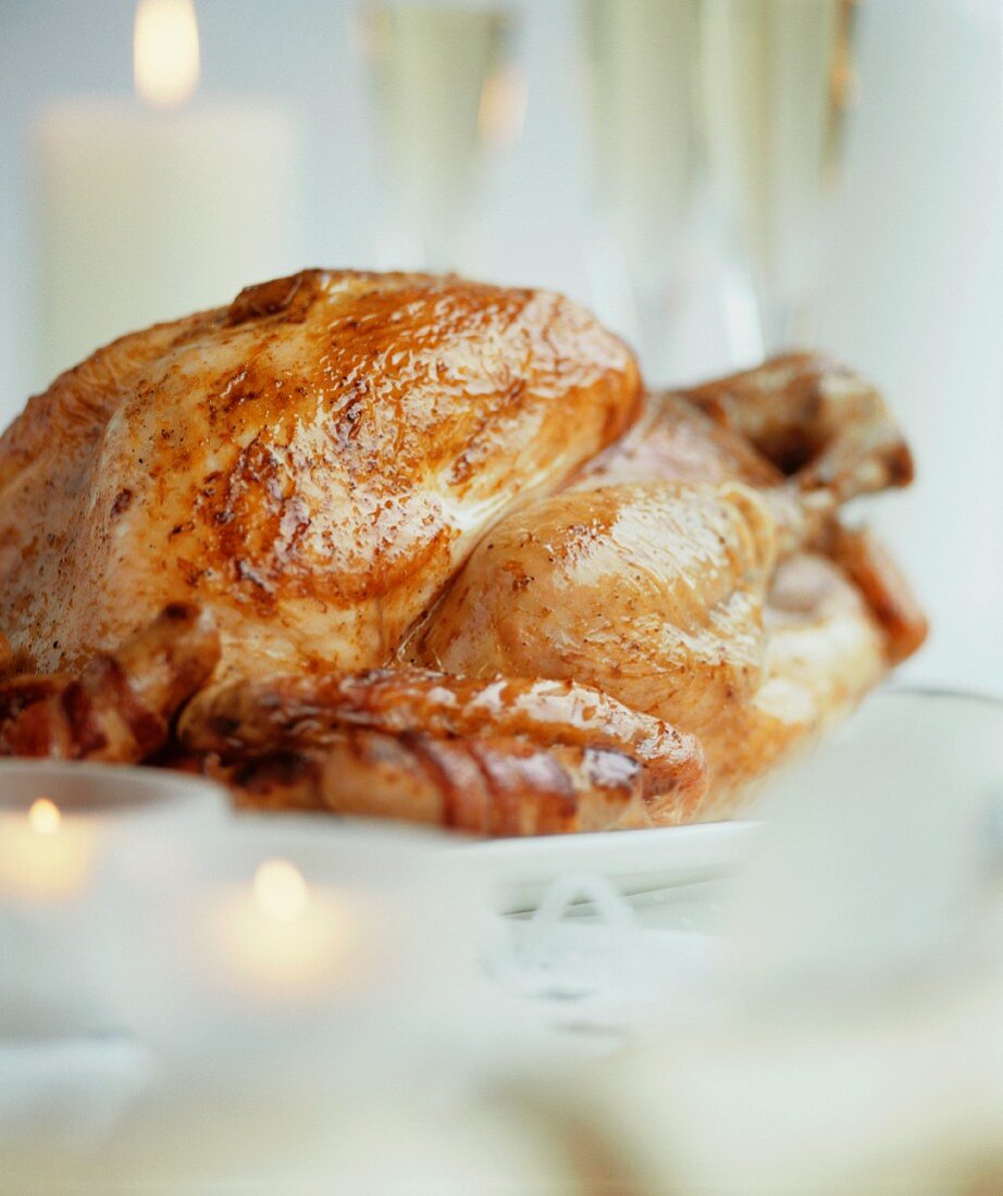Roast turkey on festive table