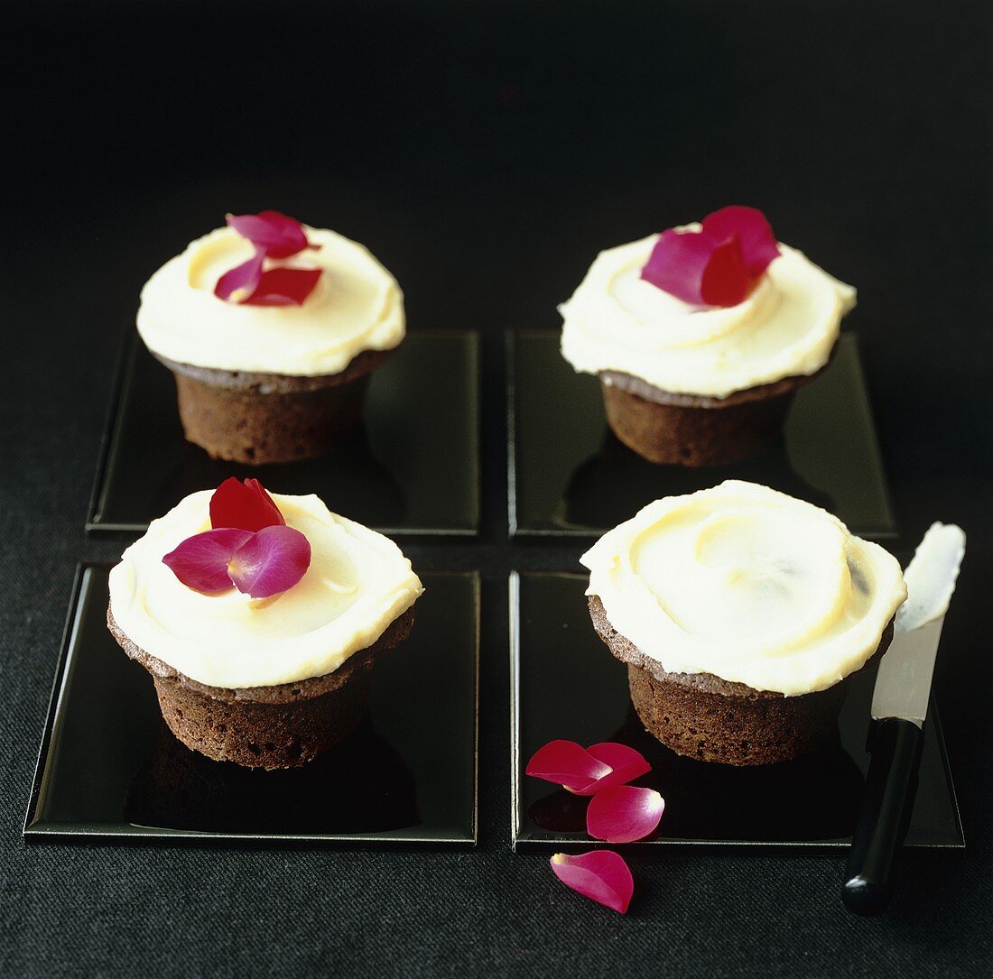 Chocolate cupcakes with rose petals
