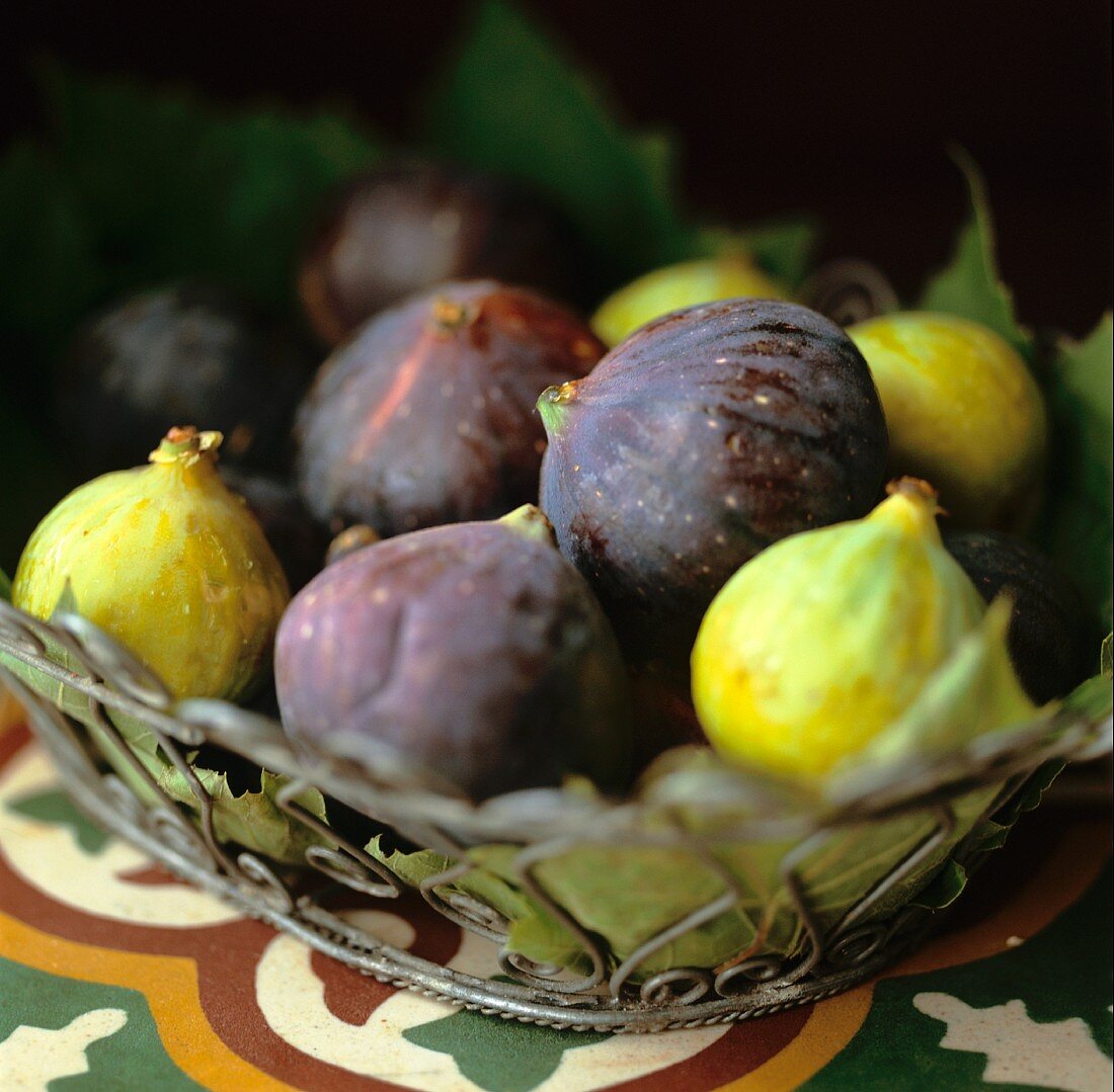 Fresh figs in a metal basket