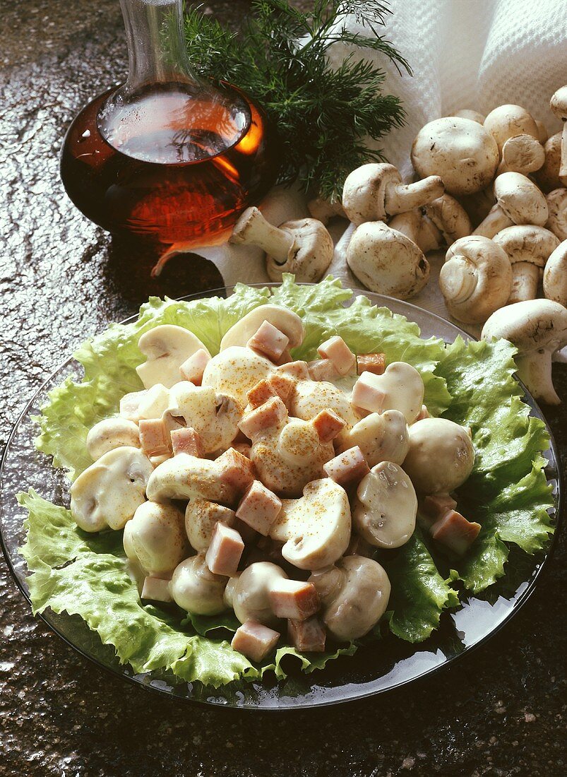 Raw mushroom salad with ham