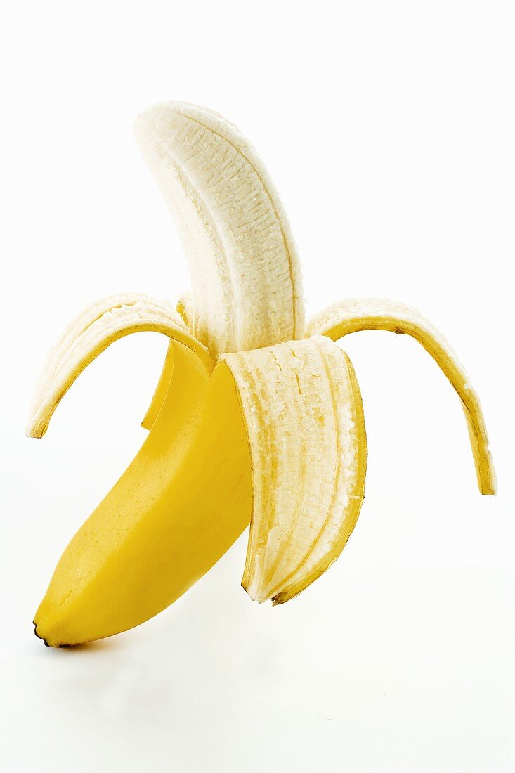 A half-peeled banana