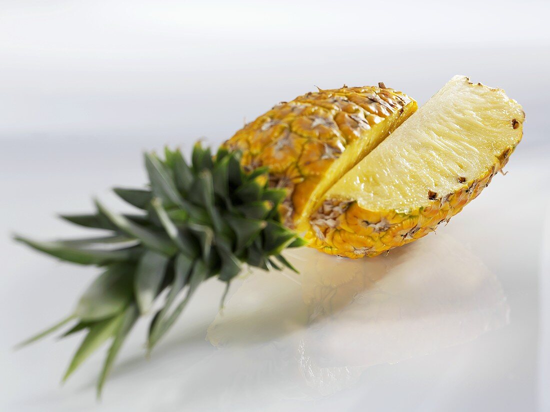 A pineapple, cut into pieces