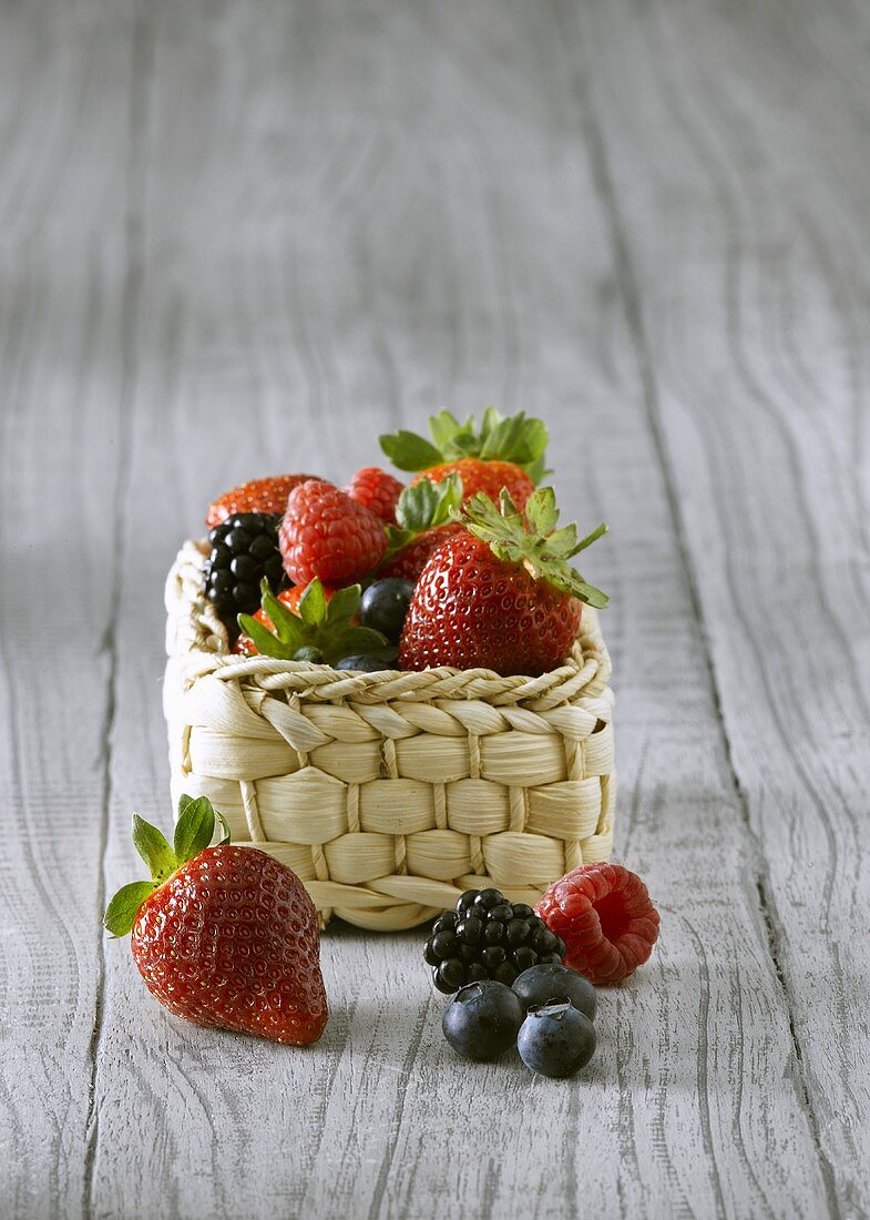 Mixed berries in a small basket