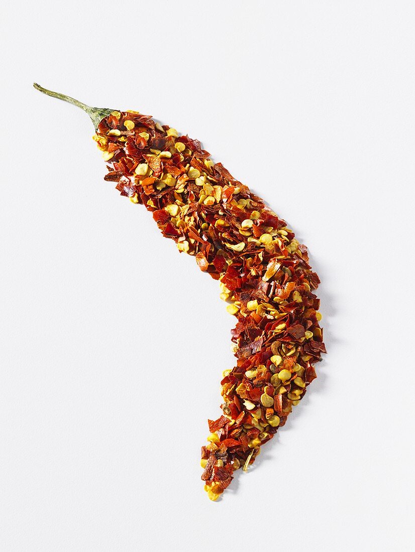 Chopped, dried chillies in shape of a chilli