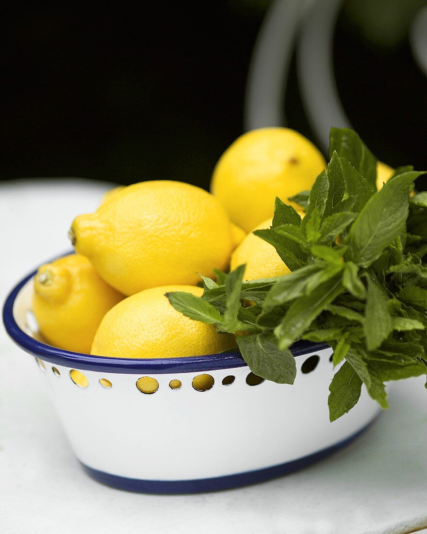 Fresh lemons in a dish