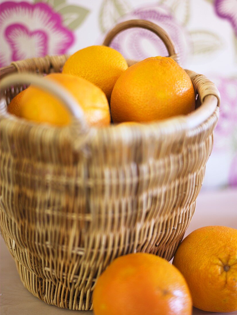 Fresh oranges in a basket